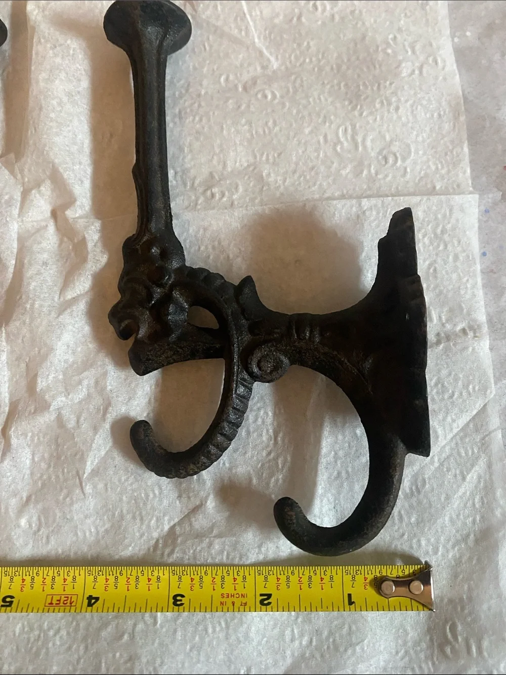 Vintage pair of cast Iron wall hooks. Lion’s head